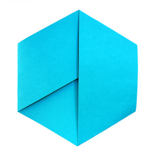 The front is connected to the
                back with a half twist. Can you see a resemblance to the
                1960s peace sign?